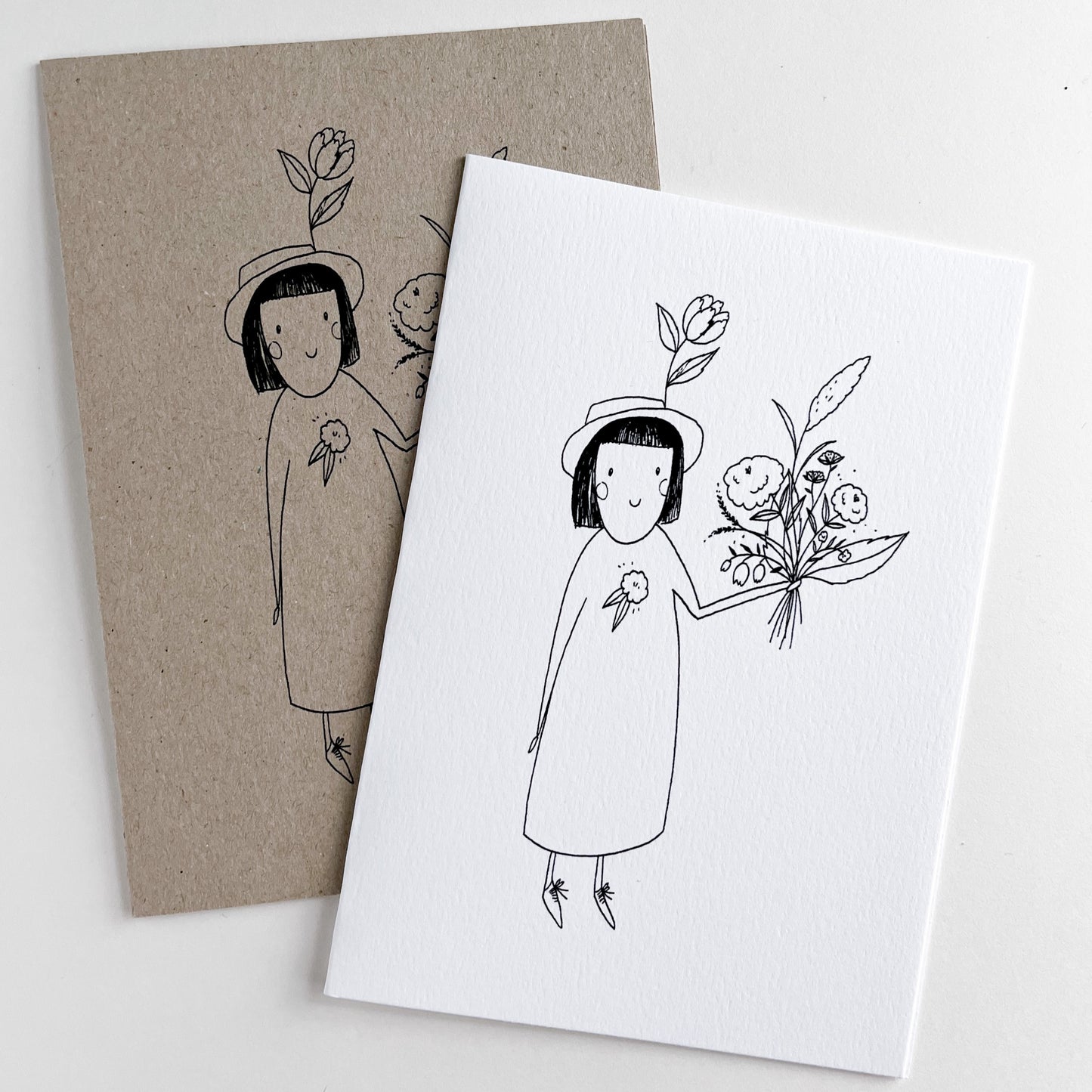 Kort med blomsterjente